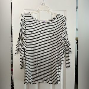 Mid length cut out sleeve top